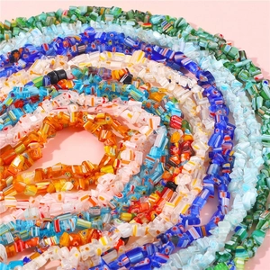 Colorful irregular Millefiori glass beads in a spiral arrangement for DIY jewelry