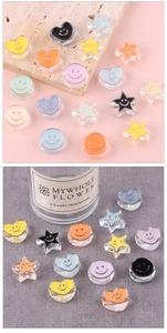 Assorted colorful acrylic smiley face charms in heart, star, and round shapes for DIY jewelry