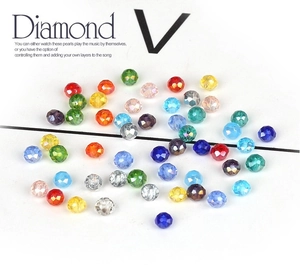 Macro detail of multi-color faceted 3mm glass crystal beads for DIY jewelry making