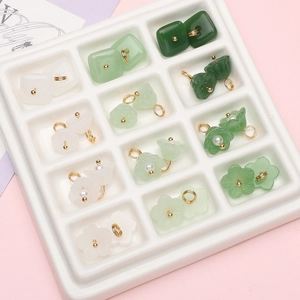 DIY jewelry accessories featuring bell orchid and safety buckle designs in jade-like glass