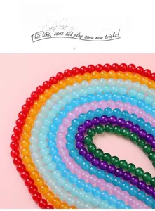 Detail view of 6mm and 8mm colorful translucent glass jelly beads for DIY jewelry making