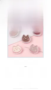 Macro detail of cat-shaped acrylic drop oil beads for DIY jewelry and phone chain making