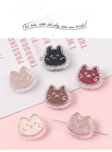 Detailed view of colorful acrylic cat beads with through-holes for DIY jewelry making