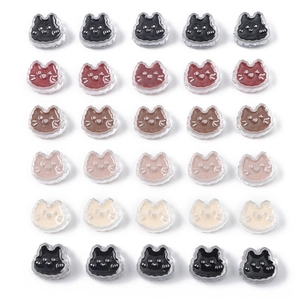 Assorted colorful cat-shaped acrylic beads for DIY jewelry making in a neat matrix layout