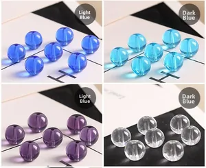 Polished glass beads in blue and purple with center holes for DIY jewelry making
