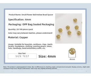Close-up of 4mm hollow gold floral bead spacers made of copper for jewelry making