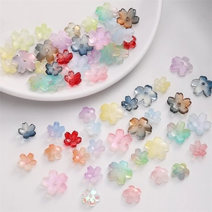 Detail of colorful cherry blossom glass beads with aurora finish for DIY jewelry