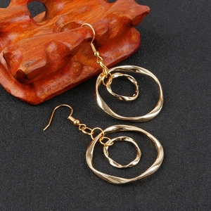 Polished gold alloy double-layer hoop earrings with irregular textured twisted design