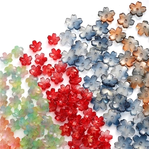 Flat lay of colorful frosted cherry blossom glass beads for DIY bracelet jewelry making