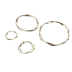 Set of four textured gold geometric metal rings for DIY jewelry making and earring design