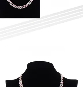 Detail of hiphop cuban link chain with pink and white crystal rhinestones