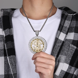 Rotating dollar sign pendant necklace with iced out crystals and silver rope chain