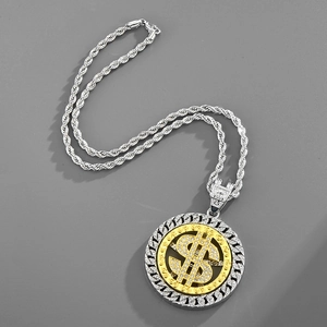 Close-up of a rotating gold dollar sign pendant with sparkling pavé crystals on a rope chain