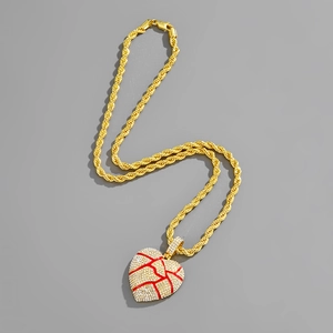 Hip hop gold rope chain with iced out broken heart pendant and red cracked details