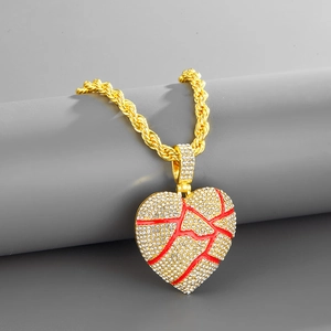 Hip-hop broken heart pendant with red cracks and crystals on a gold rope chain
