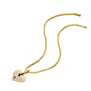 Collier hip-hop pendentif cœur brisé avec chaîne de corde dorée et zircons cubiques brillants