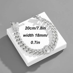 Close-up of iced-out silver Cuban chain with star dial showing 18mm width and 20cm length