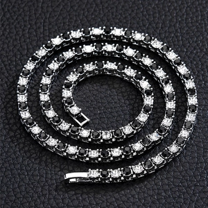 Single row 4mm tennis chain with alternating black and white zircons on silver base