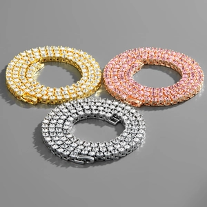 Three-row tennis chain set in gold, silver, and rose gold with sparkling zircon stones