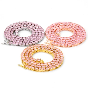 Detail of pink zircon tennis necklaces in silver, gold, and rose gold finishes
