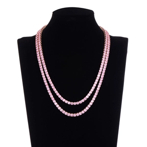 Double-layer pink zircon tennis necklace with rose gold finish on black velvet display