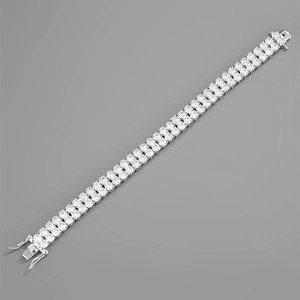 Double row CZ tennis bracelet with 14k gold plating and secure box clasp closure