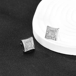Elegant square silver earrings with micro-pave crystals on a black and white background
