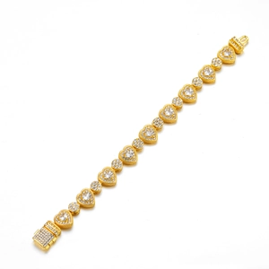 Lussuoso bracciale a maglia cubana dorata con maglie a cuore e pavé completo di zirconi