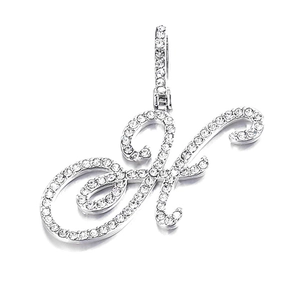 Close-up of silver letter H pendant with micro-paved zircons and sparkling bail