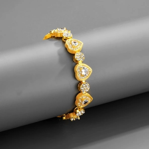 Collana hip hop dorata con maglie a cuore e tonde tempestate di strass brillanti e chic