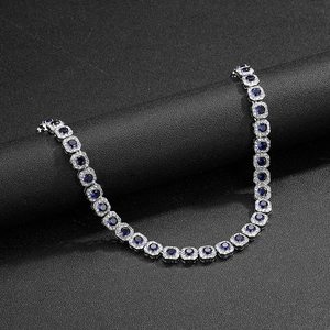 Silver cuban chain necklace with sapphire blue stones and white zircon accents