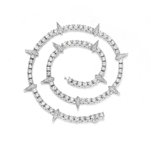 Hip hop silver tennis chain with spiked triangle charms and sparkling CZ stones