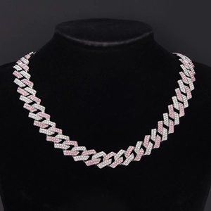 Close-up of hip hop cuban chain necklace with pink and white micro-paved rhinestones