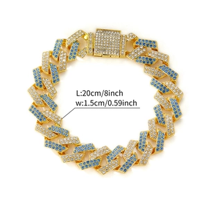 Macro view of gold cuban link chain with blue and white crystals and size measurements
