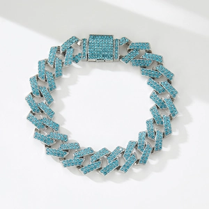 Close-up of hip-hop Cuban link chain with luxury sky blue rhinestones and silver base