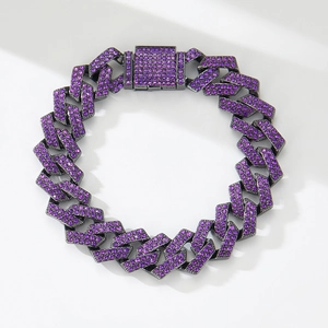 Detailed close-up of dark purple rhinestones on black metal cuban link necklace