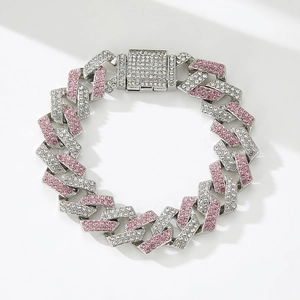 Detail of silver Cuban link chain with pink and clear rhinestones and box clasp