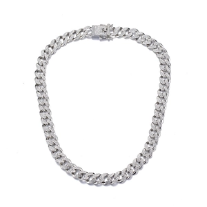 Close-up of iced out silver Cuban link chain with diamond set square box safety clasp