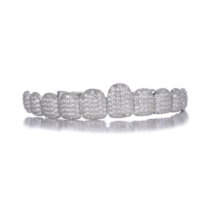 Detailed close-up of hip hop silver grillz with pave-set shimmering cubic zirconia