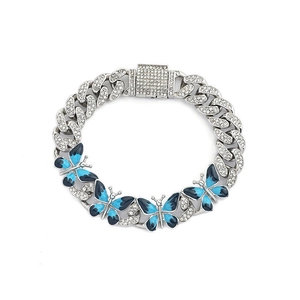 Silver Cuban link bracelet with five blue enamel butterflies and crystal micro-pave