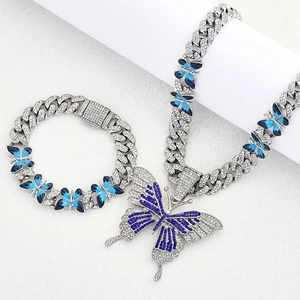 Parure hiphop avec collier pendentif papillon bleu et bracelet à chaîne cubaine