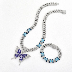 Parure hip hop chaîne cubaine argentée avec pendentifs papillon bleus et strass