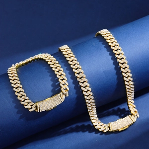 Iced out 12mm Cuban link necklace and bracelet set in gold finish with sparkling crystals