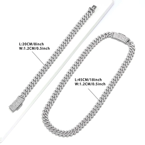 Detailed view of silver iced out Cuban link chain set with dimensions 18 and 8 inches