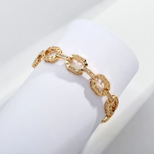 Bracelet gourmette luxe plaqué or 18K avec maillons hexagonaux sertis de zircons