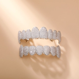 Detailed view of silver-plated hip hop grillz with shimmering pavé zircon stones