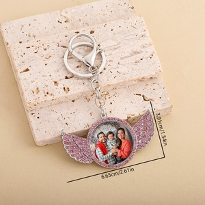 Portachiavi con ali di strass rosa e cornice per foto personalizzata in lega d'argento