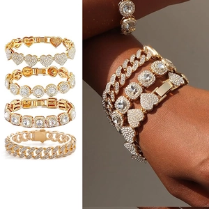 Set of four gold-plated iced out Cuban link bracelets with sparkling heart and tennis chains