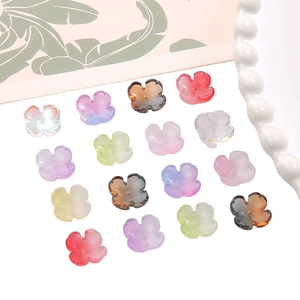 Macro detail of mixed color glass flower petals for DIY jewelry making and hairpins