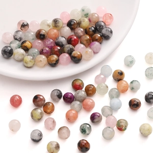 Macro shot of colorful faceted natural stone beads for DIY jewelry making accessories